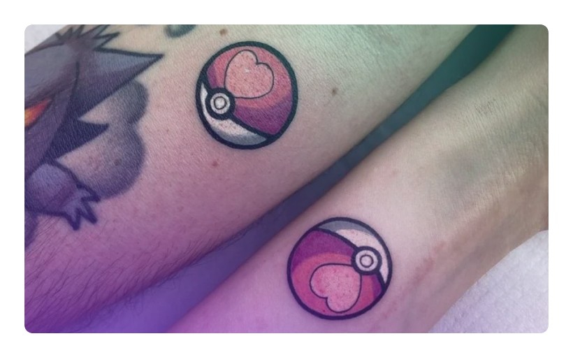 The love ball couple tattoo