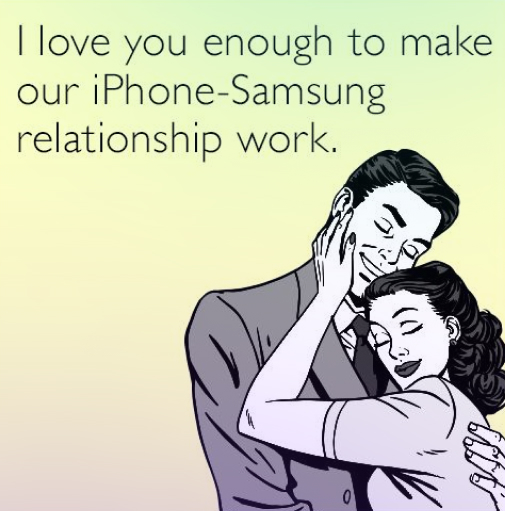 Man and woman hugging on a yellow background. I love you enough to make our iPhone-Samsung relationship work.